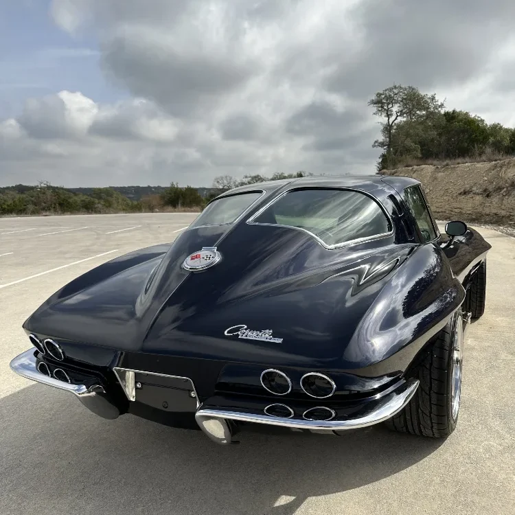 Rear angle of ceramic coated split window Corvette showing high gloss finish and quad exhaust