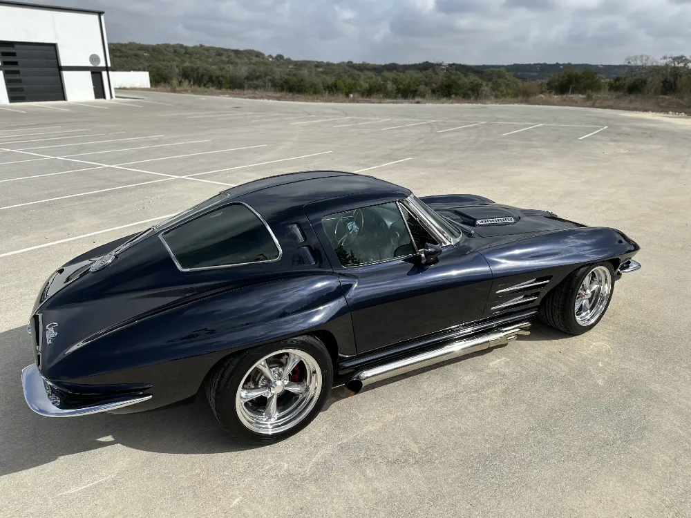 Side profile of split window Corvette restomod after paint correction and ceramic coating