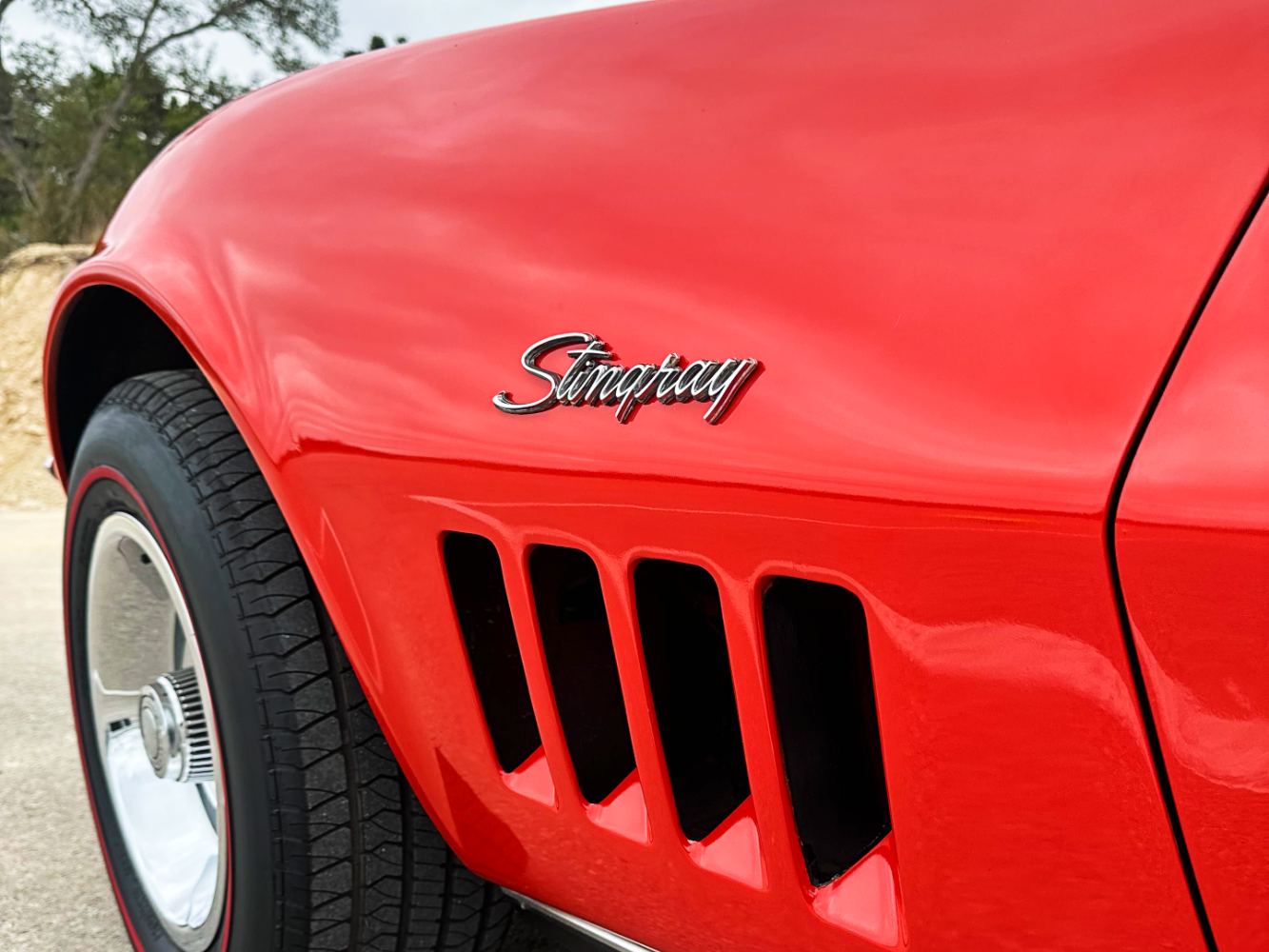 Corvette Fender Vent and Badge Restoration Corvette Stingray fender vent detail after single-stage paint correction