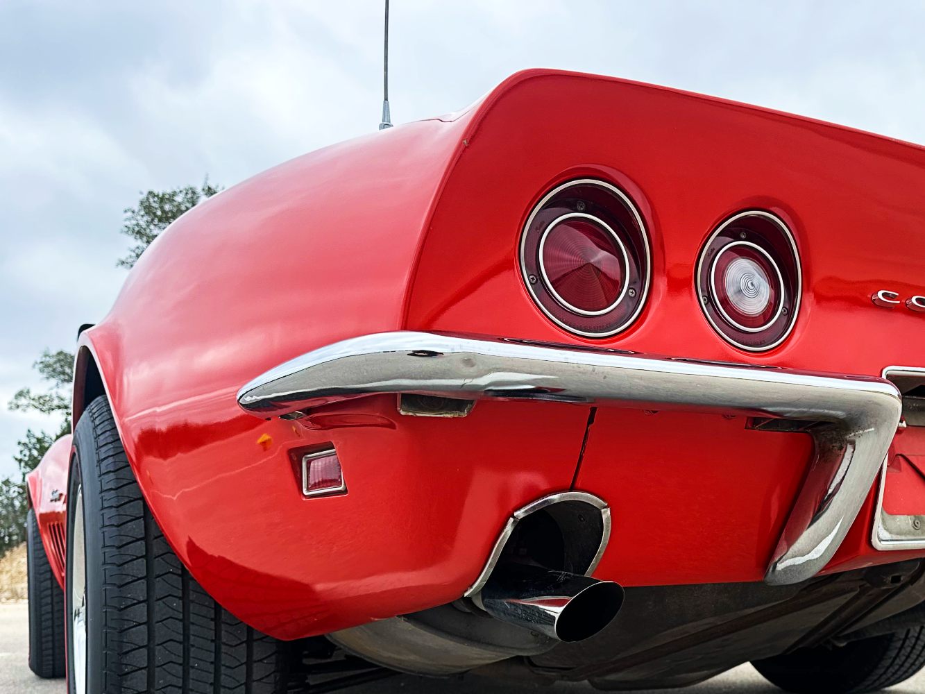 Classic Corvette Rear-End After Paint Correction Rear view of red Corvette Stingray after ceramic coating and detailing