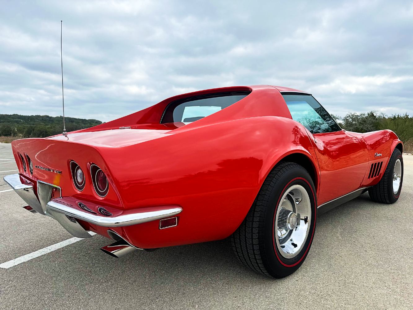 Classic Corvette Stingray Rear Detail After Ceramic Coating Red Corvette Stingray rear driver-side view after paint correction and ceramic coating