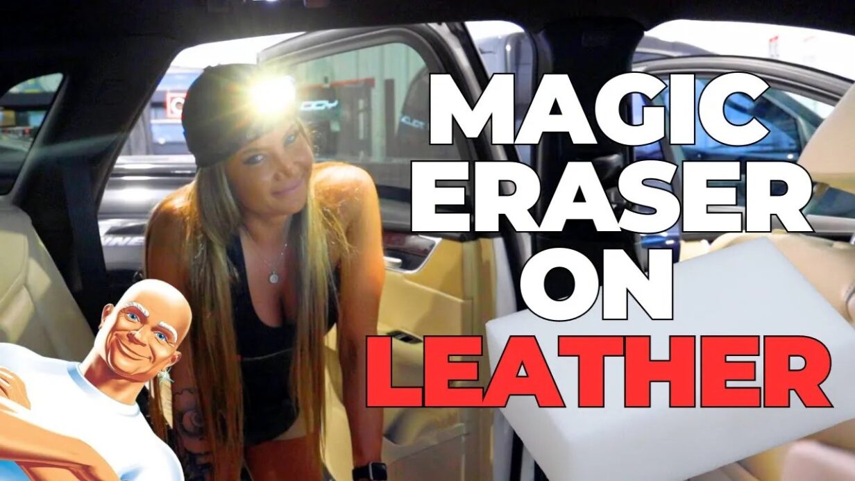 Jen from Carsmotology using a magic eraser to clean tan leather car seats