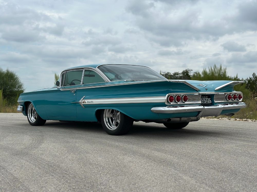 1960 Chevy Impala rear three-quarter view after ceramic coating in Boerne TX