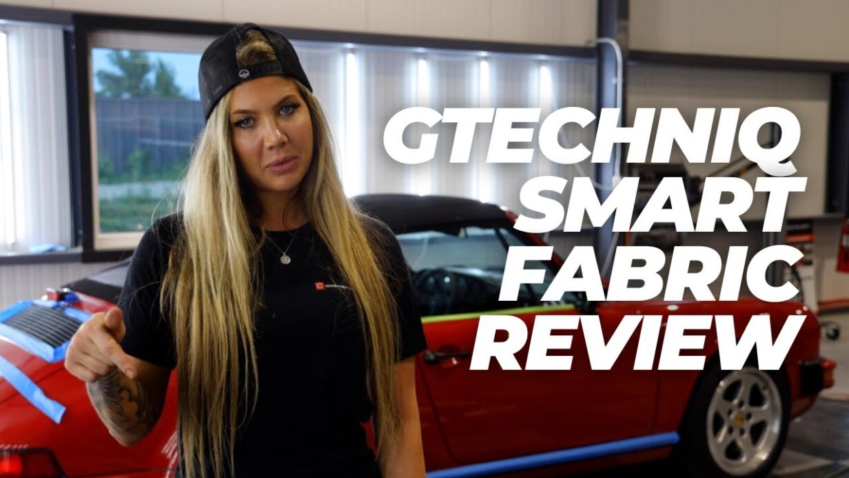 Carsmotology detailer reviewing Gtechniq Smart Fabric fabric protection with a red Porsche 911 in the shop