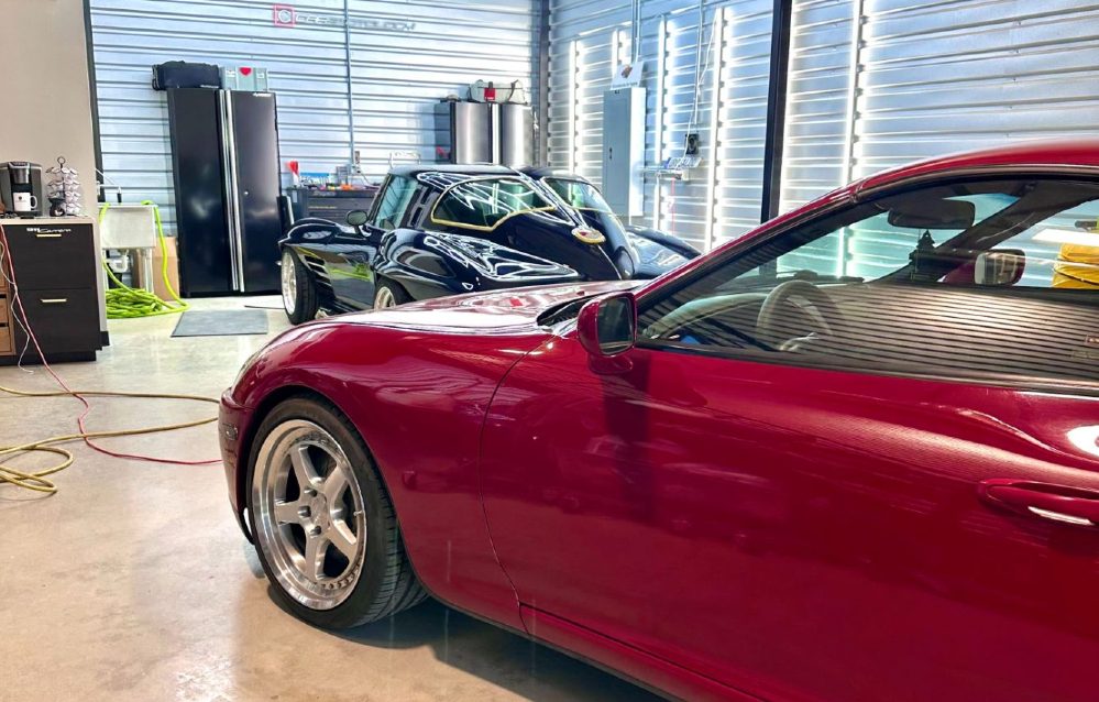 Red single stage paint Supra being polished at Carsmotology auto detailing shop in Boerne TX
