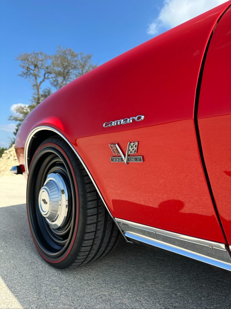 Fender emblem detail of 1967 Chevrolet Camaro SS/RS with 396 Turbo-Jet badge, matte wheel, and Carsmotology gloss