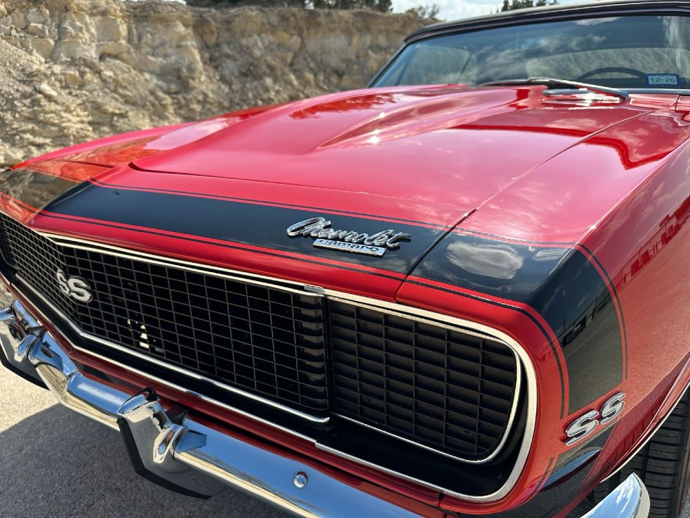 Hood and grille of 1967 Chevrolet Camaro SS/RS with black stripe and glossy Carsmotology ceramic-coated finish